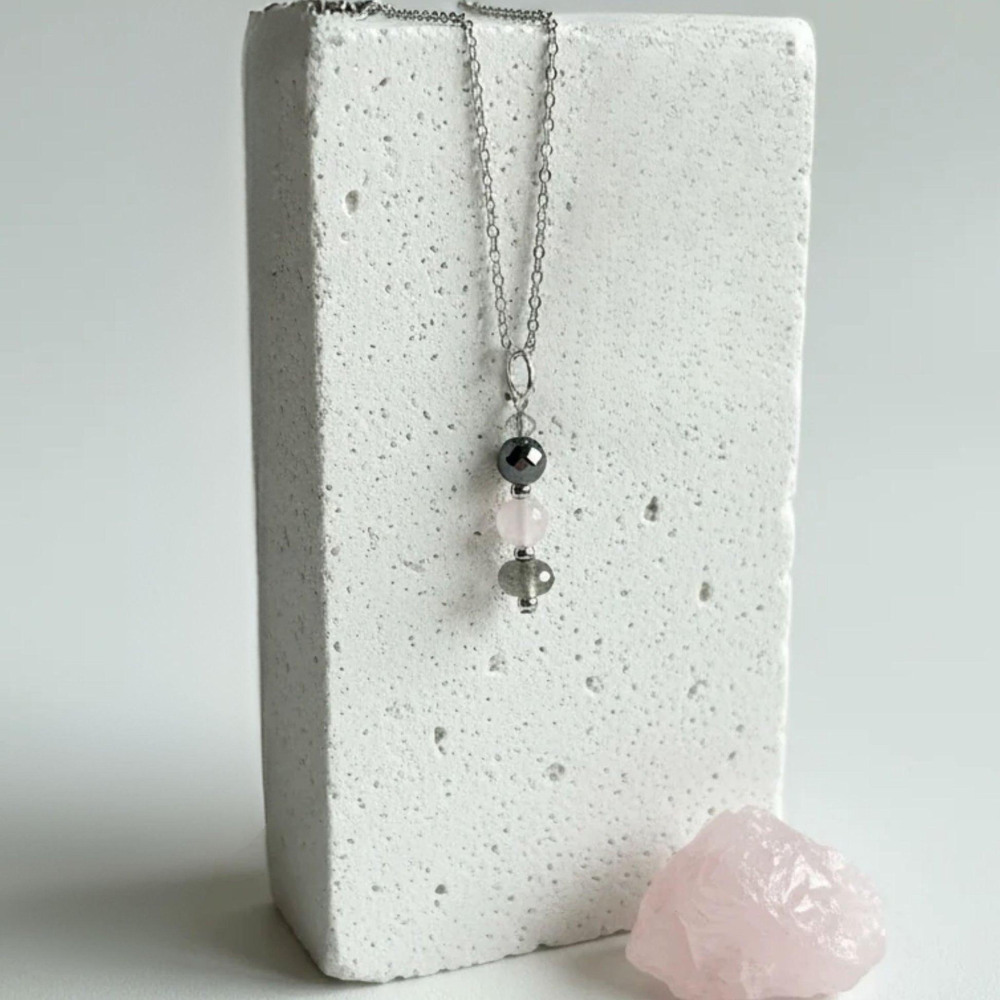 Still Light necklace on a silver plated chain with labradorite, rose quartz and pyrite drop, made by hand in Calgary