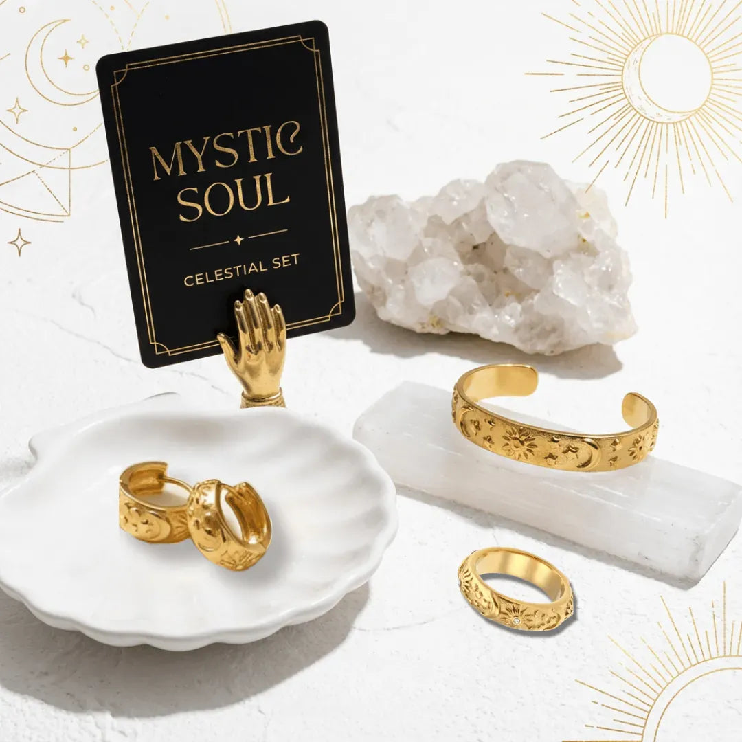 Gold jewelry set with 'Mystic Soul' packaging on a decorative background