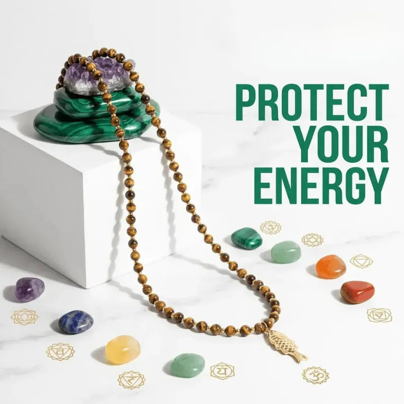 Necklace with beads and crystals on a white background with text 'Protect Your Energy'.