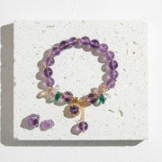 Faceted purple amethyst stretch bracelet on the wrist, February birthstone jewelry