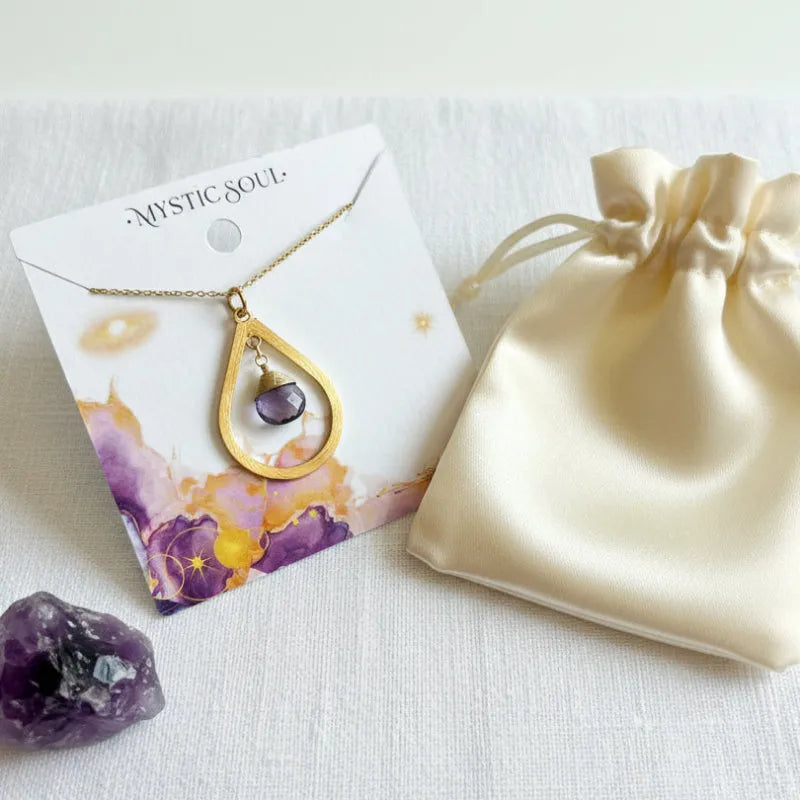 Genuine amethyst drop pendant necklace with its gift bag