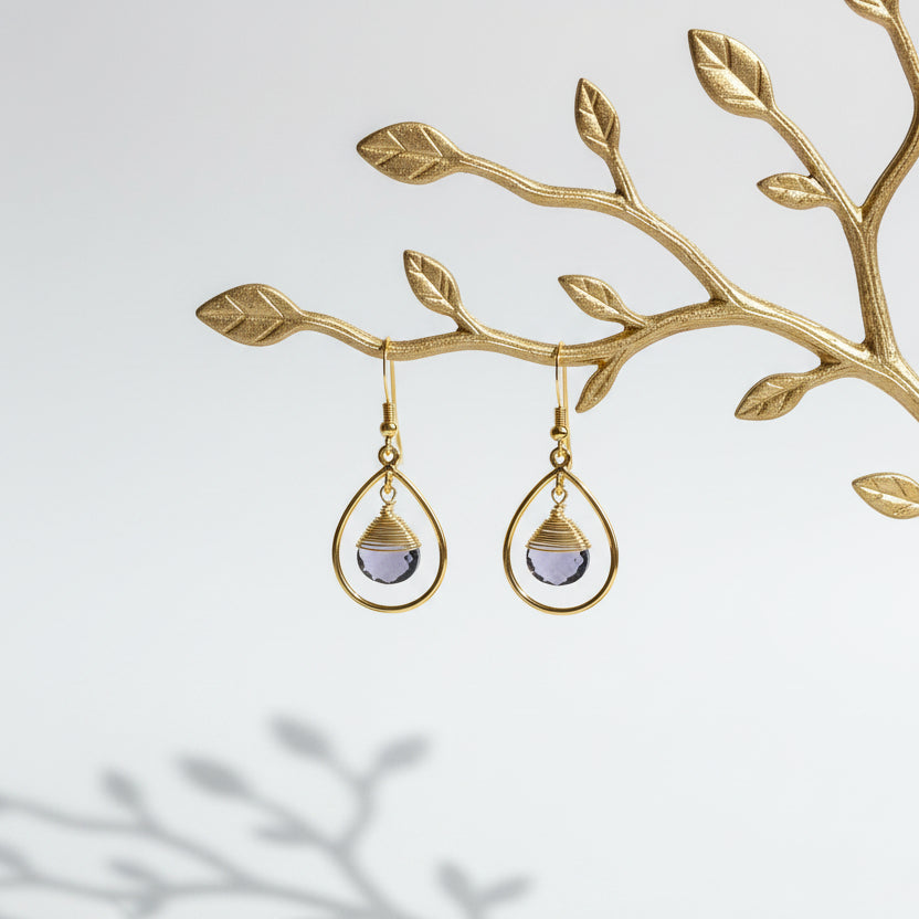 Gold fine hoop earrings with faceted amethyst drops