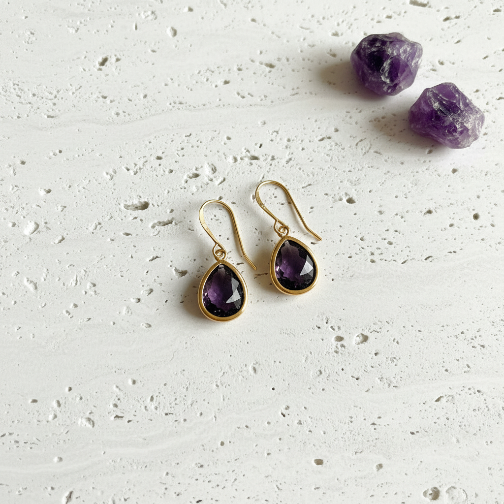 Amethyst purple faceted glass drop earrings in gold plated brass