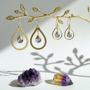 Gold amethyst hoop earrings in fine hoop and bold teardrop styles, February birthstone jewelry