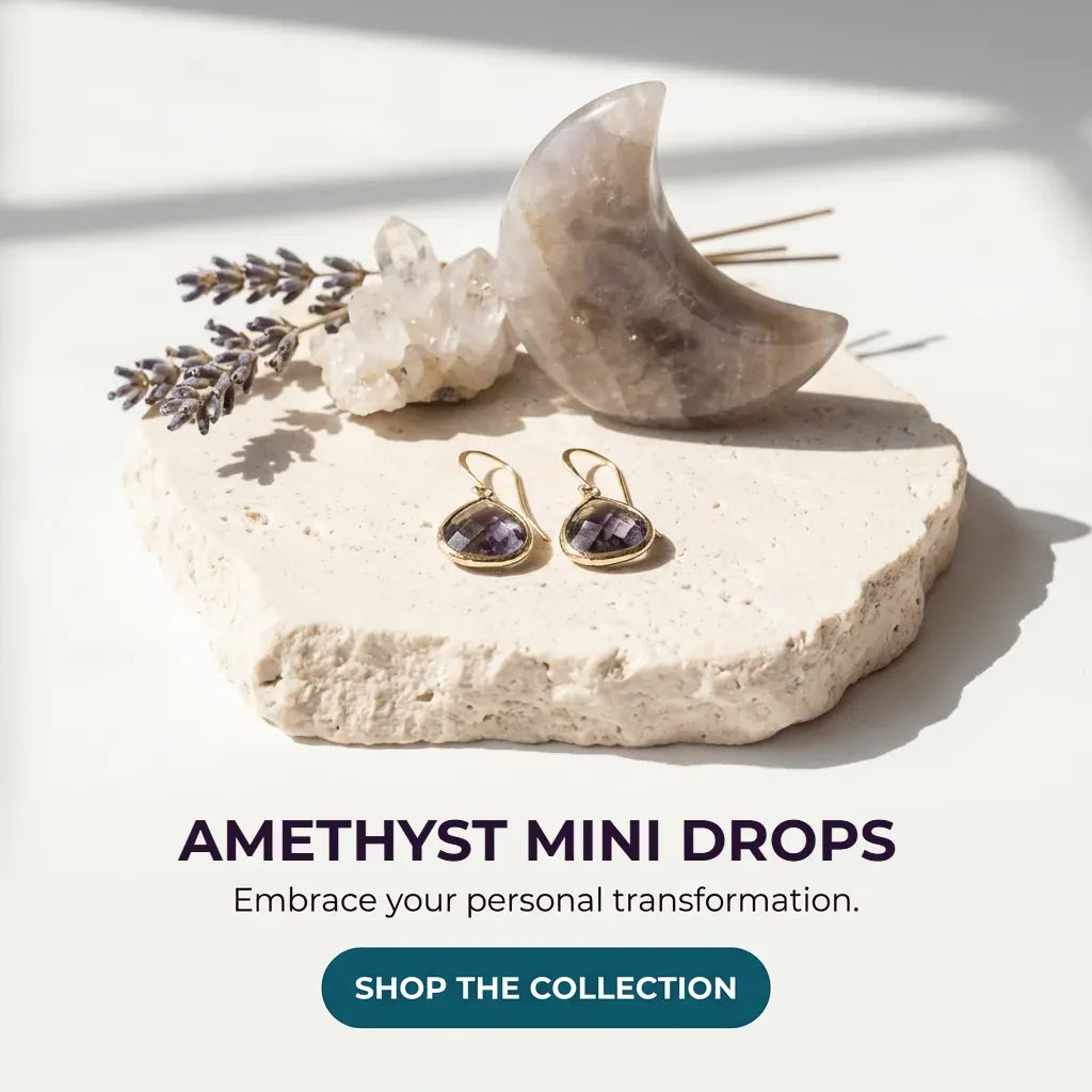 Amethyst mini drop earrings on a stone surface with lavender and crystals, promotional text overlay.