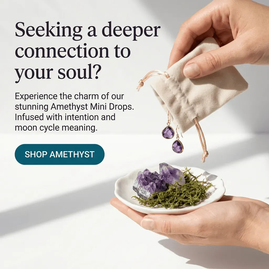 Hand holding a small bag with amethyst earrings over a plate with crystals and herbs, with text promoting Amethyst Mini Drops.