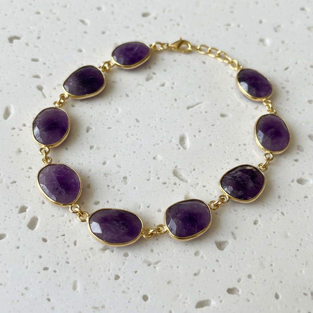 Natural amethyst oval bracelet detail on gold plated links, February birthstone