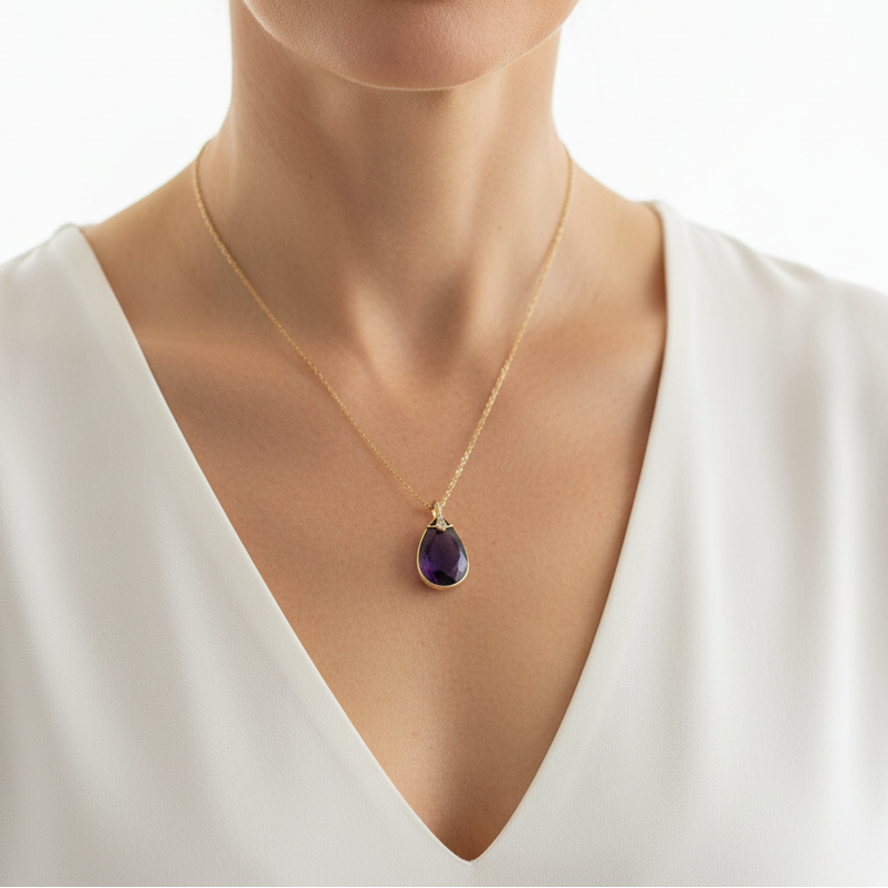 Slim faceted amethyst teardrop pendant on a fine gold chain — February birthstone jewelry