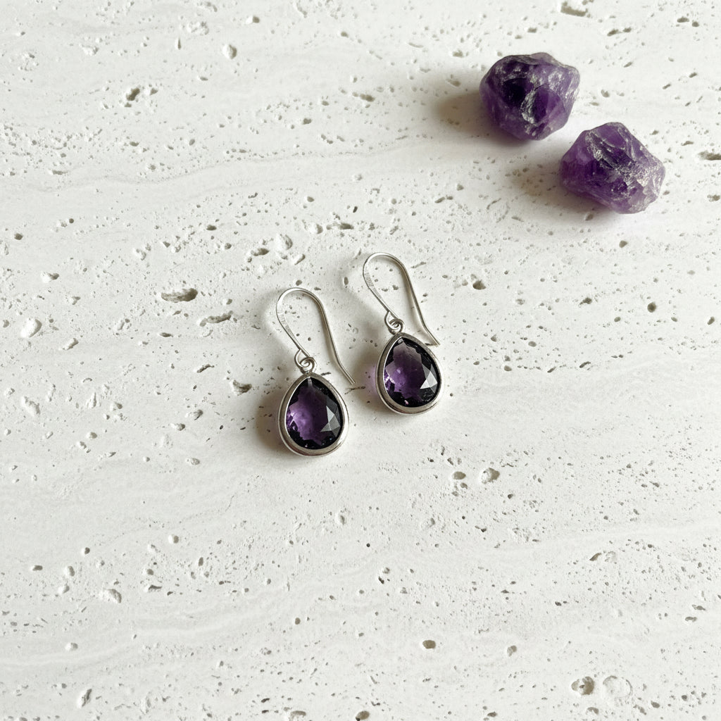 Amethyst purple faceted glass drop earrings in silver plated brass