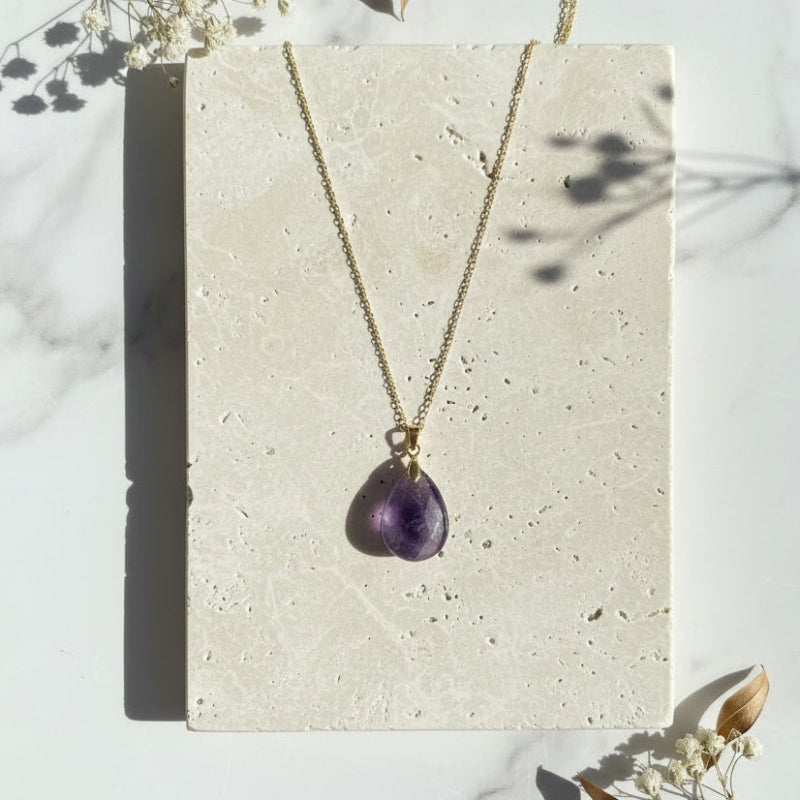 Gold amethyst teardrop pendant necklace with a plain bail — February birthstone jewelry