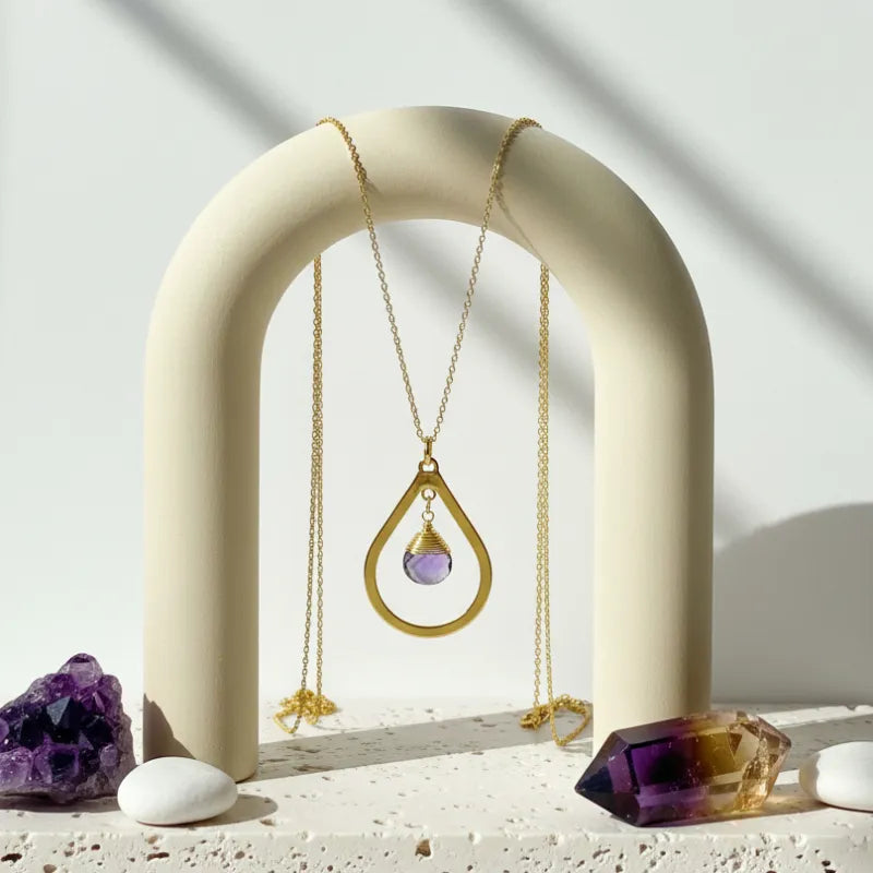Genuine amethyst drop necklace in the thick gold style, hanging