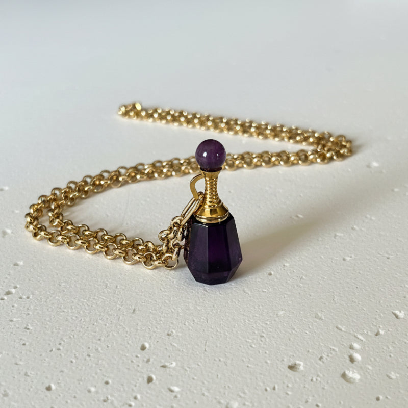 Amethyst crystal vial necklace with unscrewing gold top on gold plated chain, February birthstone keepsake