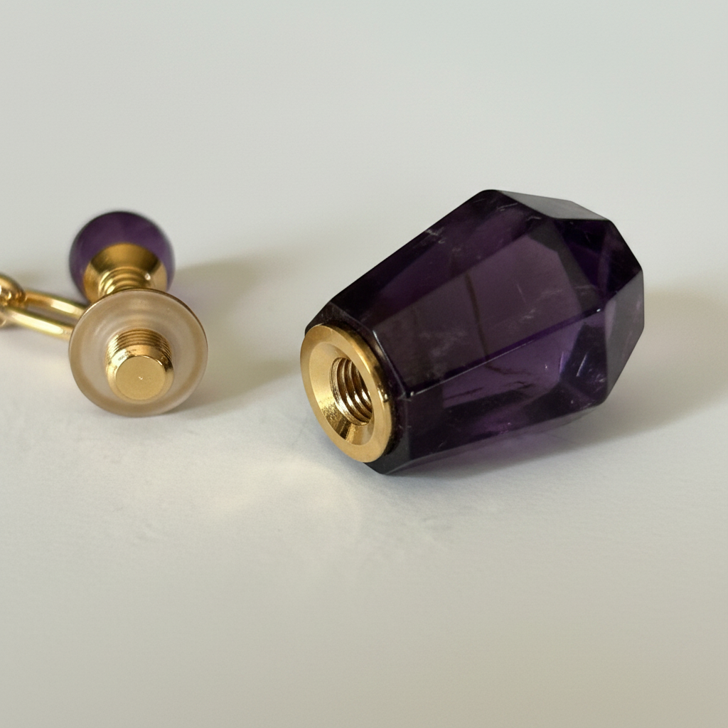 Amethyst crystal vial keepsake necklace detail, glass vessel on gold plated chain, February birthstone