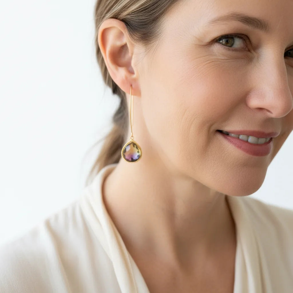 Ametrine drop earrings in gold with purple and gold gradient stones