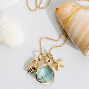 Gold aqua blue shell and starfish pendant necklace — ocean spirit necklace for calm and flow
