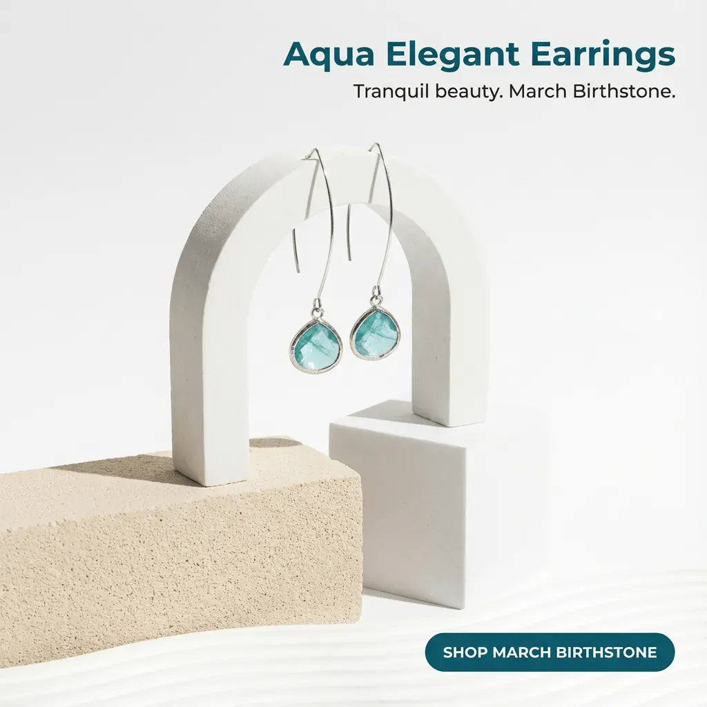 Aqua elegant earrings displayed on a white stand with a beige block background.