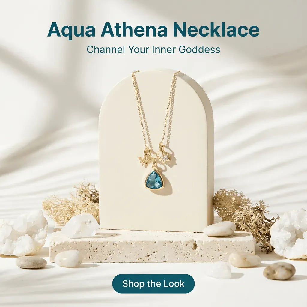 Aqua Athena Necklace displayed on a neutral background with decorative elements.
