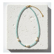 One-of-a-kind aquamarine and freshwater potato pearl necklace with gold-plated clasp by Mystic Soul Jewelry