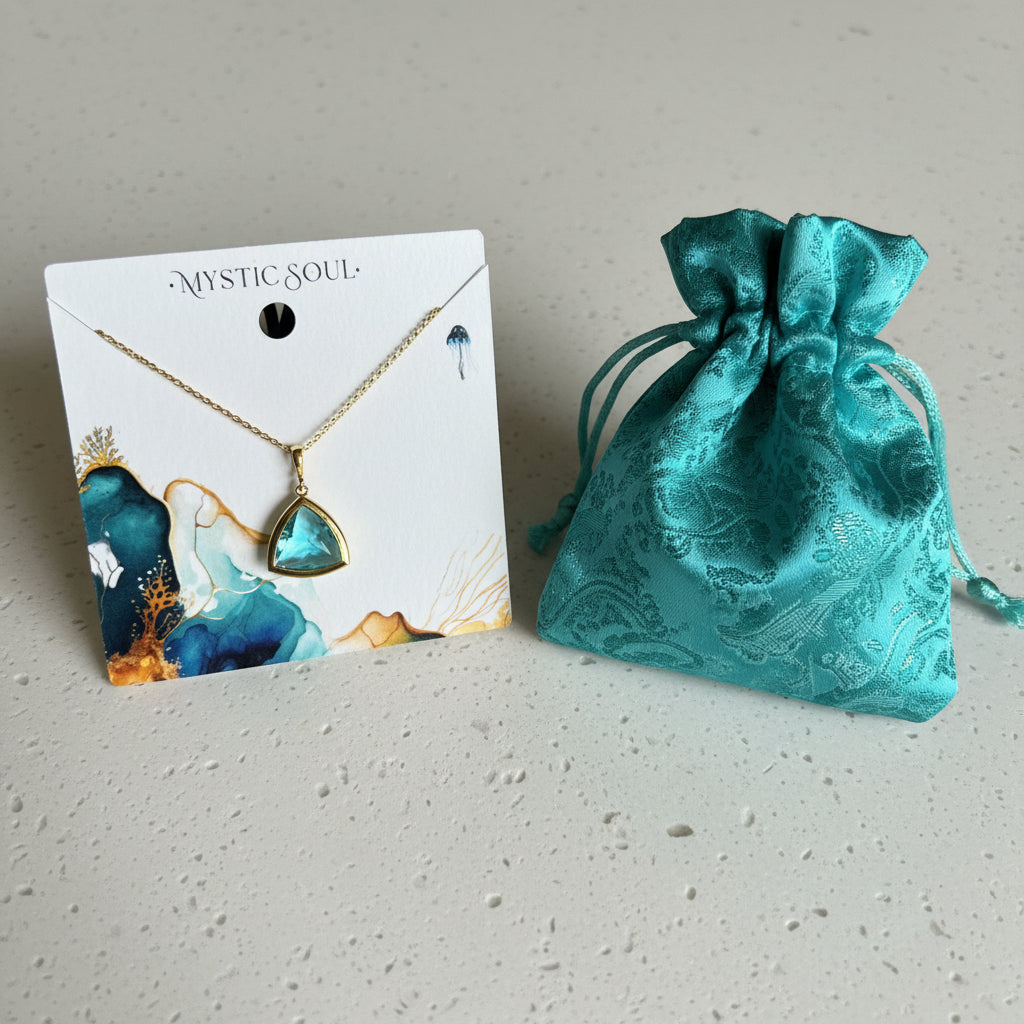 Gold Aria glass triangle pendant necklace with Mystic Soul Jewelry gift bag and tag