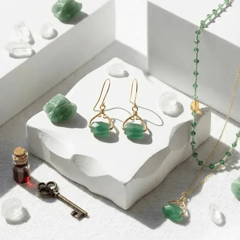 Jewelry set with green stones on a white surface, featuring text about TV shows and a call to shop.