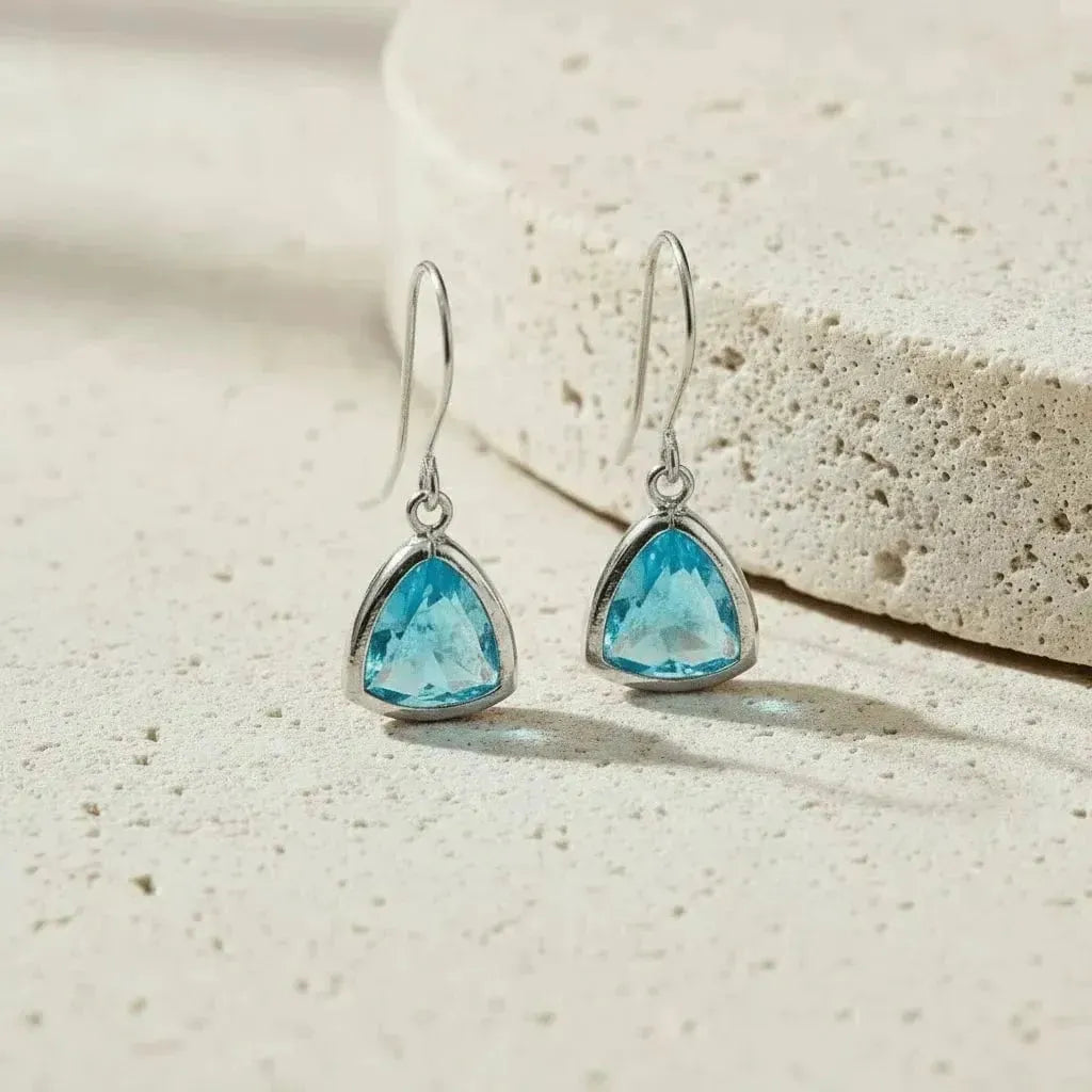 Silver Aqua Athena dangle earrings with faceted aqua glass triangle drops