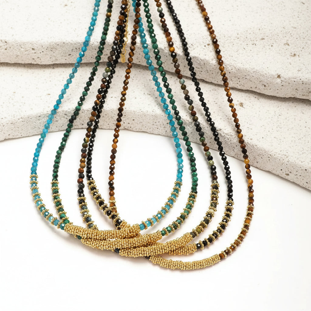 Handmade semi-precious stone beaded choker necklaces in chakra colours — turquoise, black, brown, green and gold