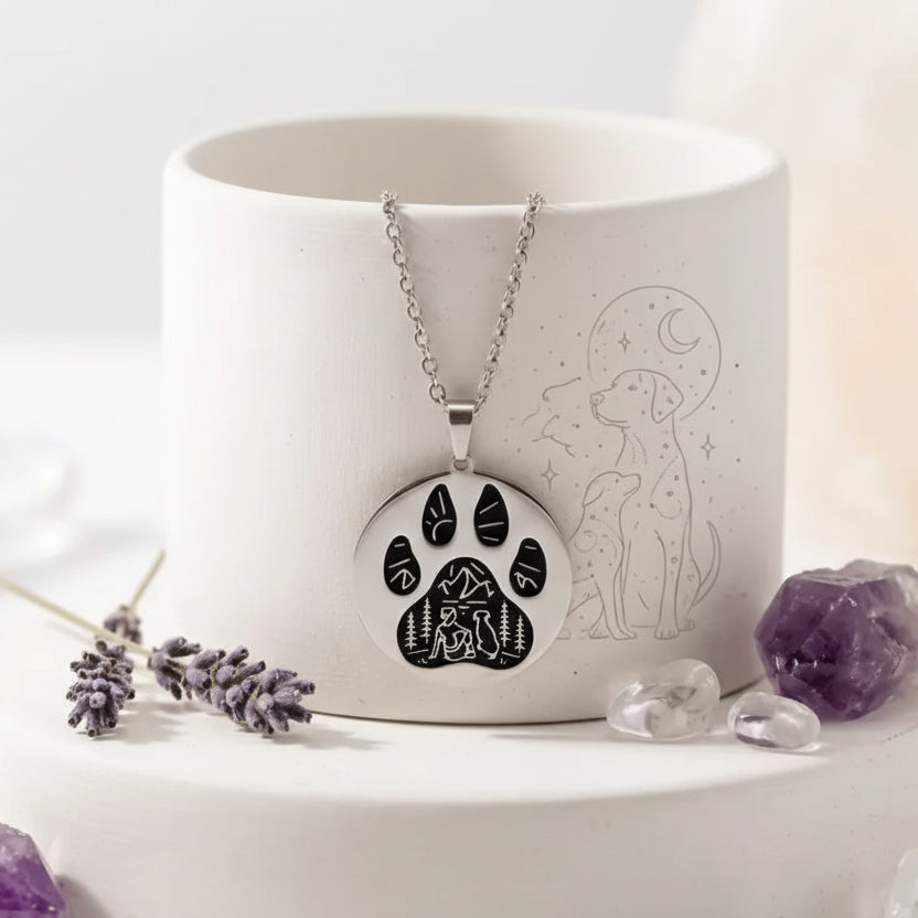 Necklace with paw print design on a white candle and crystals, with text 'Loyalty, Love, & Protection' and 'Mystic Soul Jewelry'.