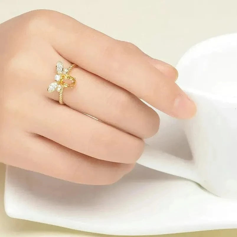 Gold ring with pearls on a hand