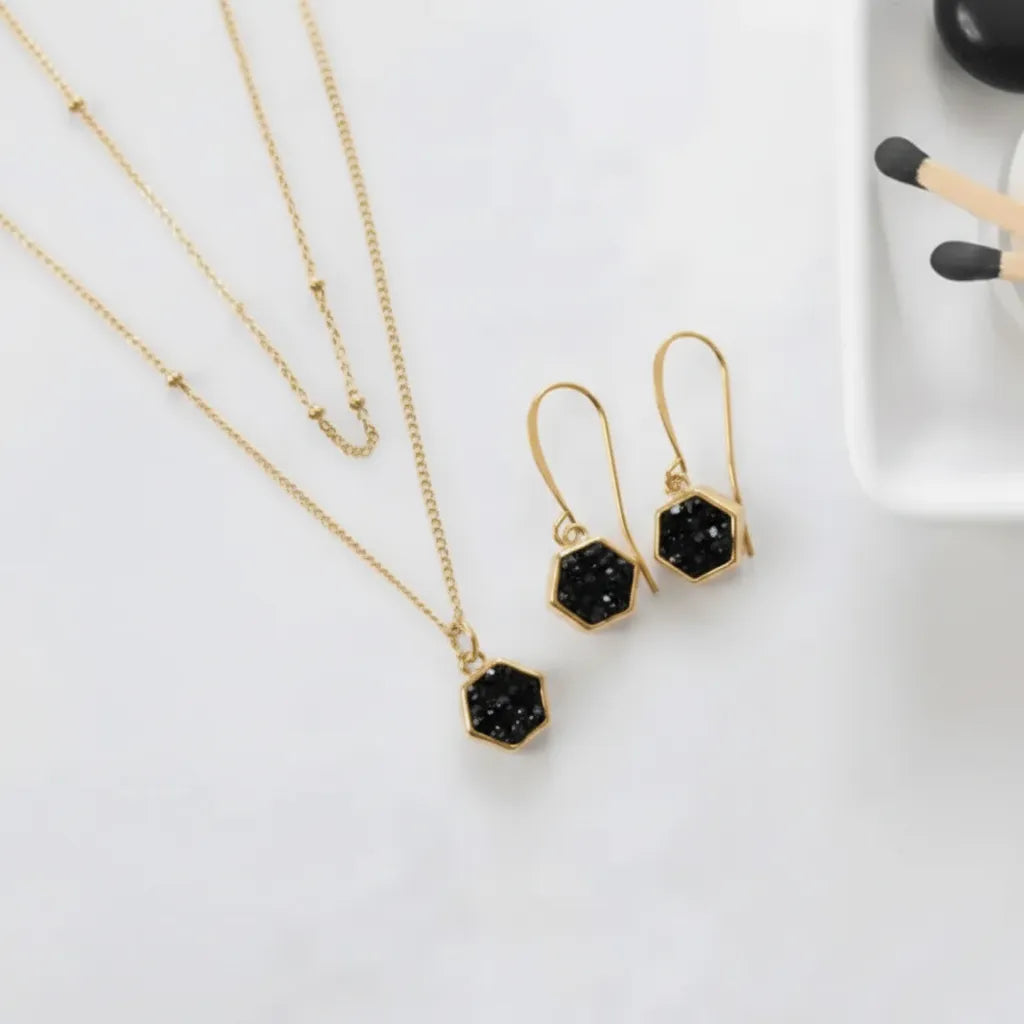 Black agate hexagon necklace and earring set on gold
