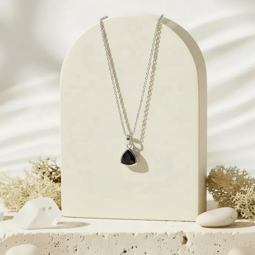 Silver Aria necklace with black faceted glass triangle pendant