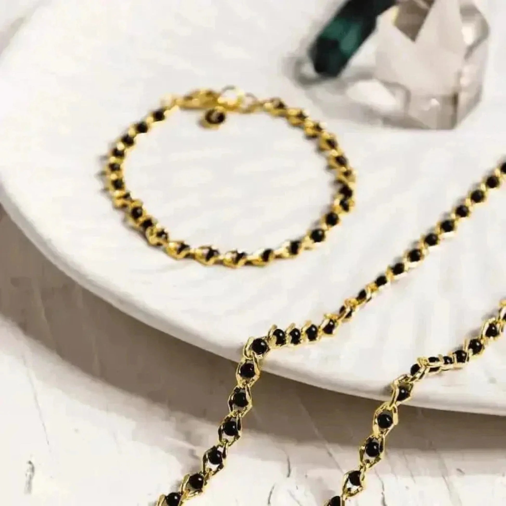 black and gold beaded necklace and bracelet jewelry set