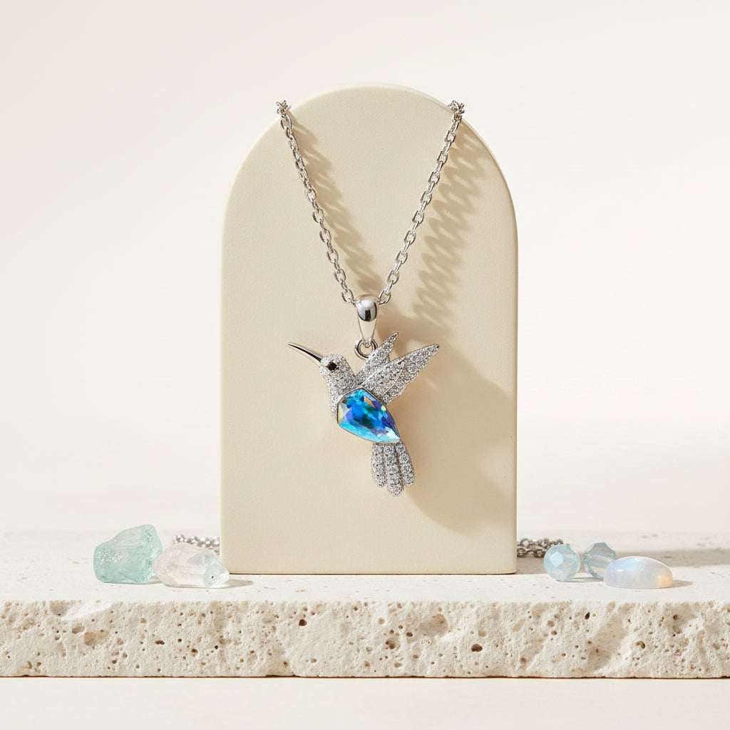 Ocean blue crystal hummingbird pendant necklace sterling silver — spirit animal jewelry for joy