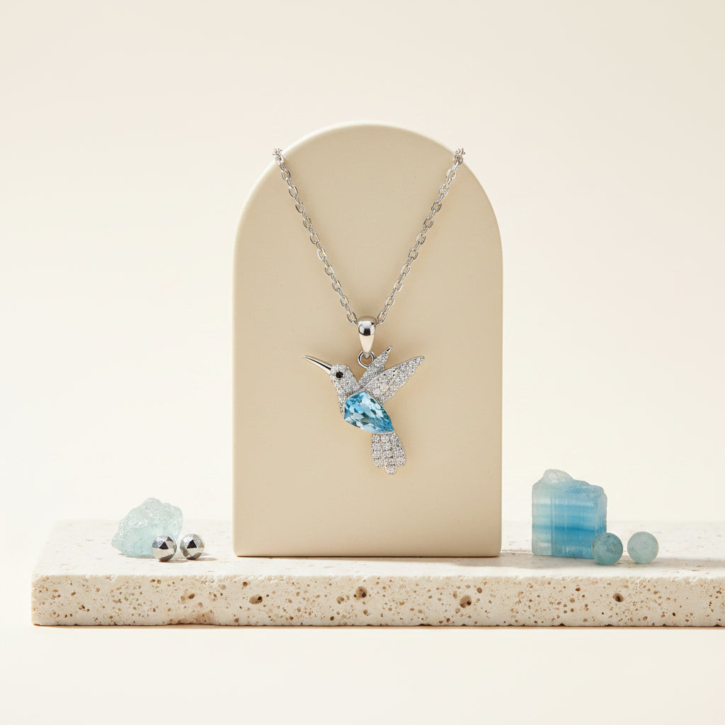 Ocean blue crystal hummingbird pendant necklace in 925 sterling silver — spirit animal jewelry for lightness