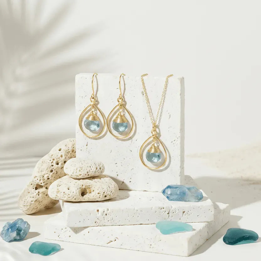 blue_topaz_earrings_and_necklace_birthstone_jewelry