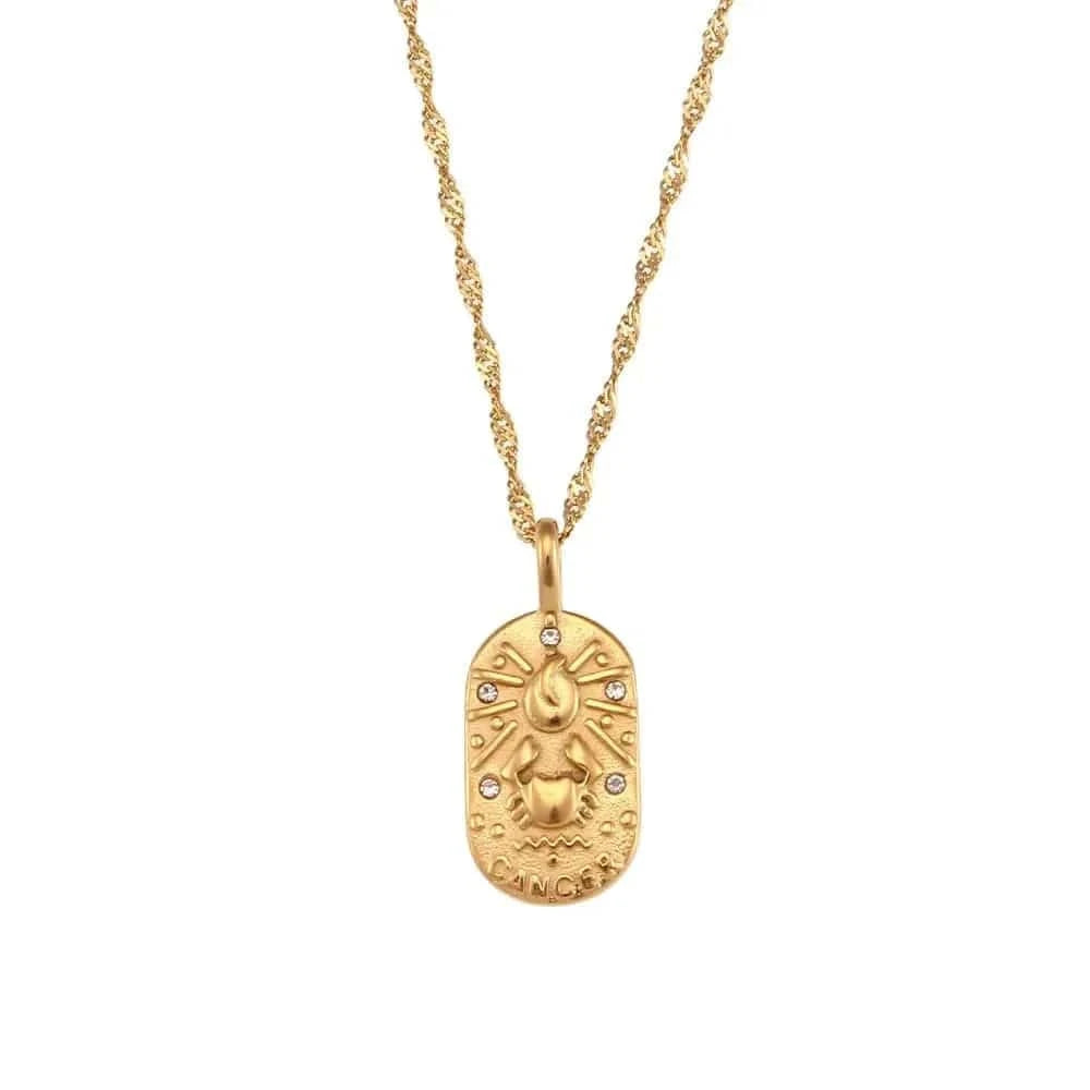 Gold necklace with a pendant on a white background