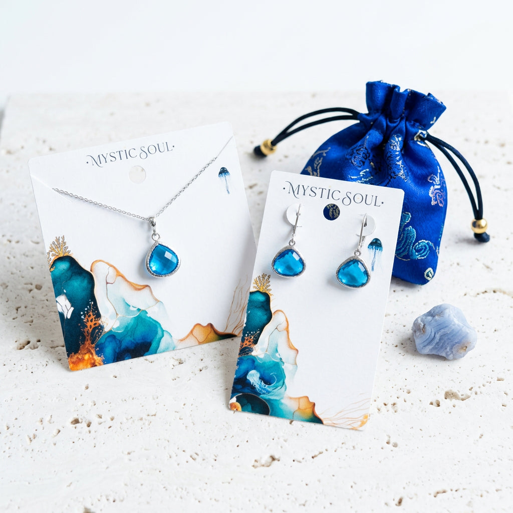 Silver Capri blue Mini Pebble necklace and leverback earrings in faceted glass with gift tag and satin pouch