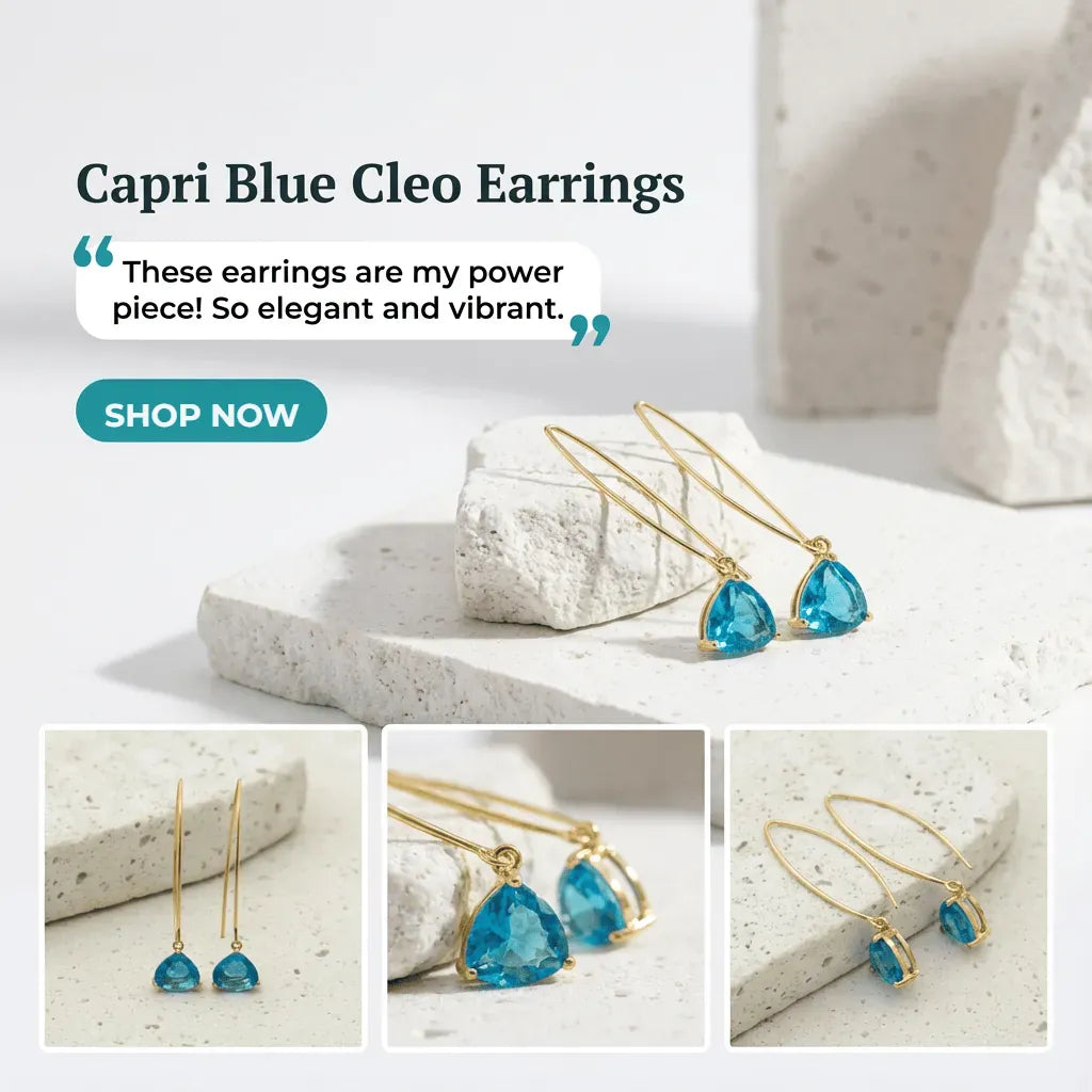 Capri Blue Cleo Earrings with gold and blue design on a light background