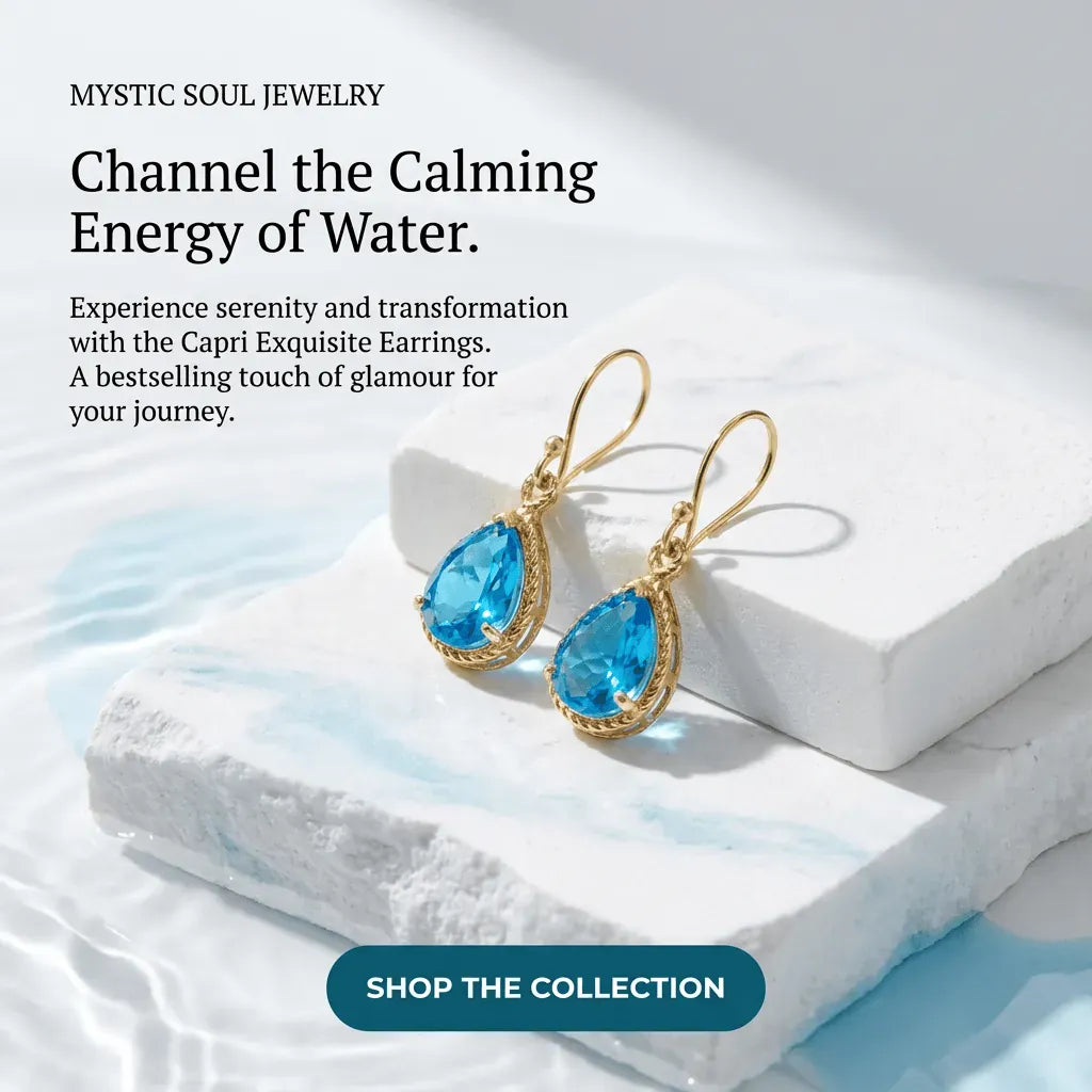 Blue teardrop earrings with gold accents on a white stone surface, featuring text about Mystic Soul Jewelry.