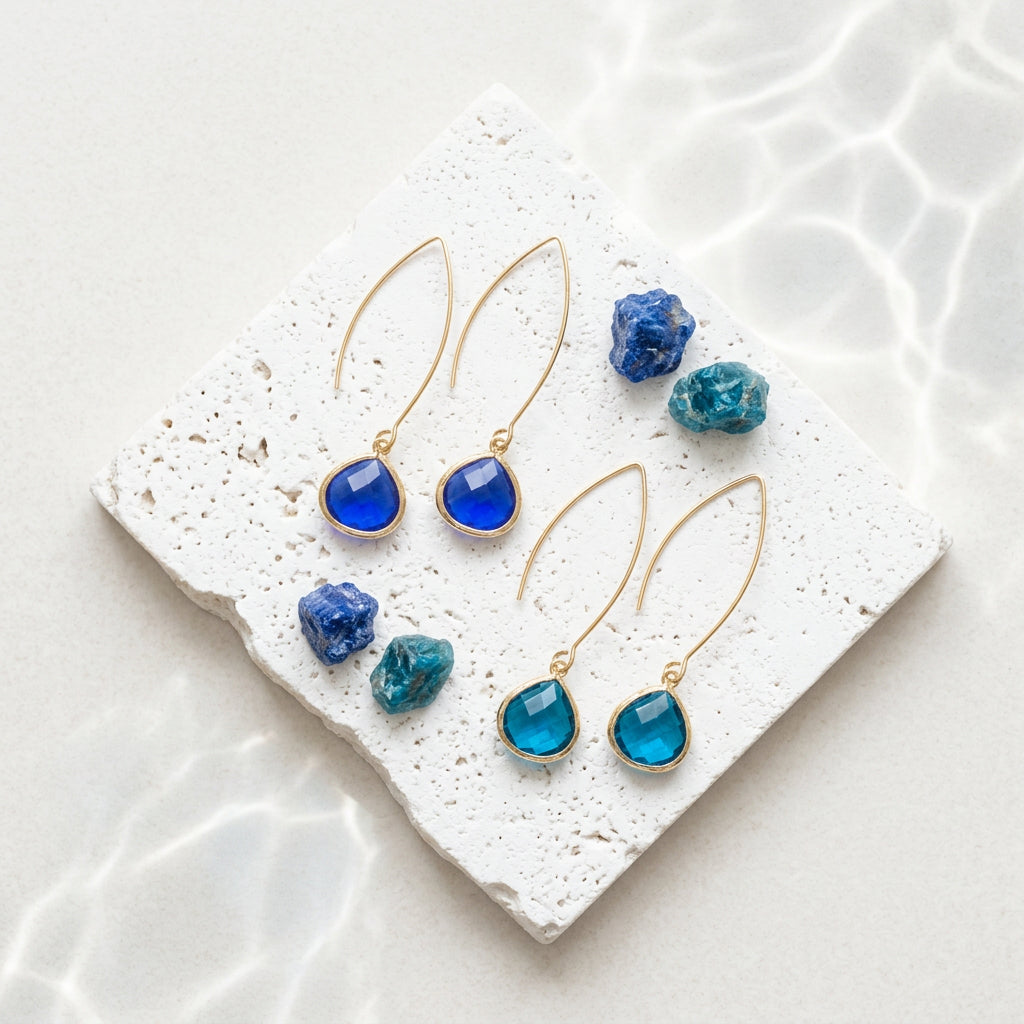 Capri blue and cobalt blue glass Elegant Pebble earrings side by side for colour comparison