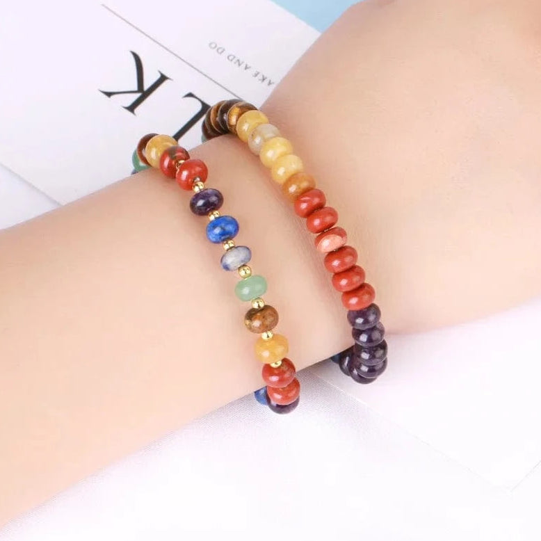 Colorful beaded bracelet on a wrist with a blurred background