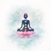 Silhouette of a person meditating on a pink lotus flower with chakra colors against a light blue background.