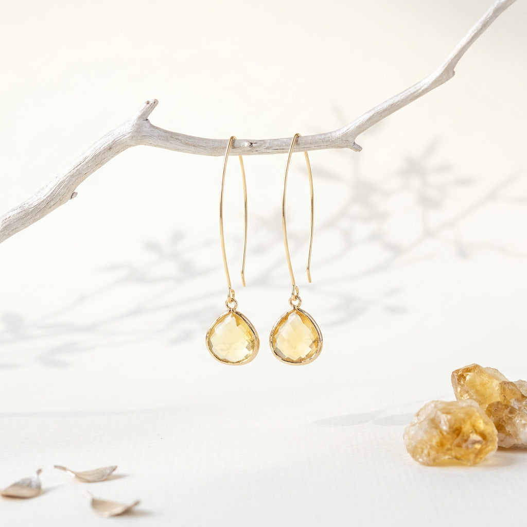 Citrine glass Elegant Pebble earrings with Mystic Soul gift pouch and tag, flat lay
