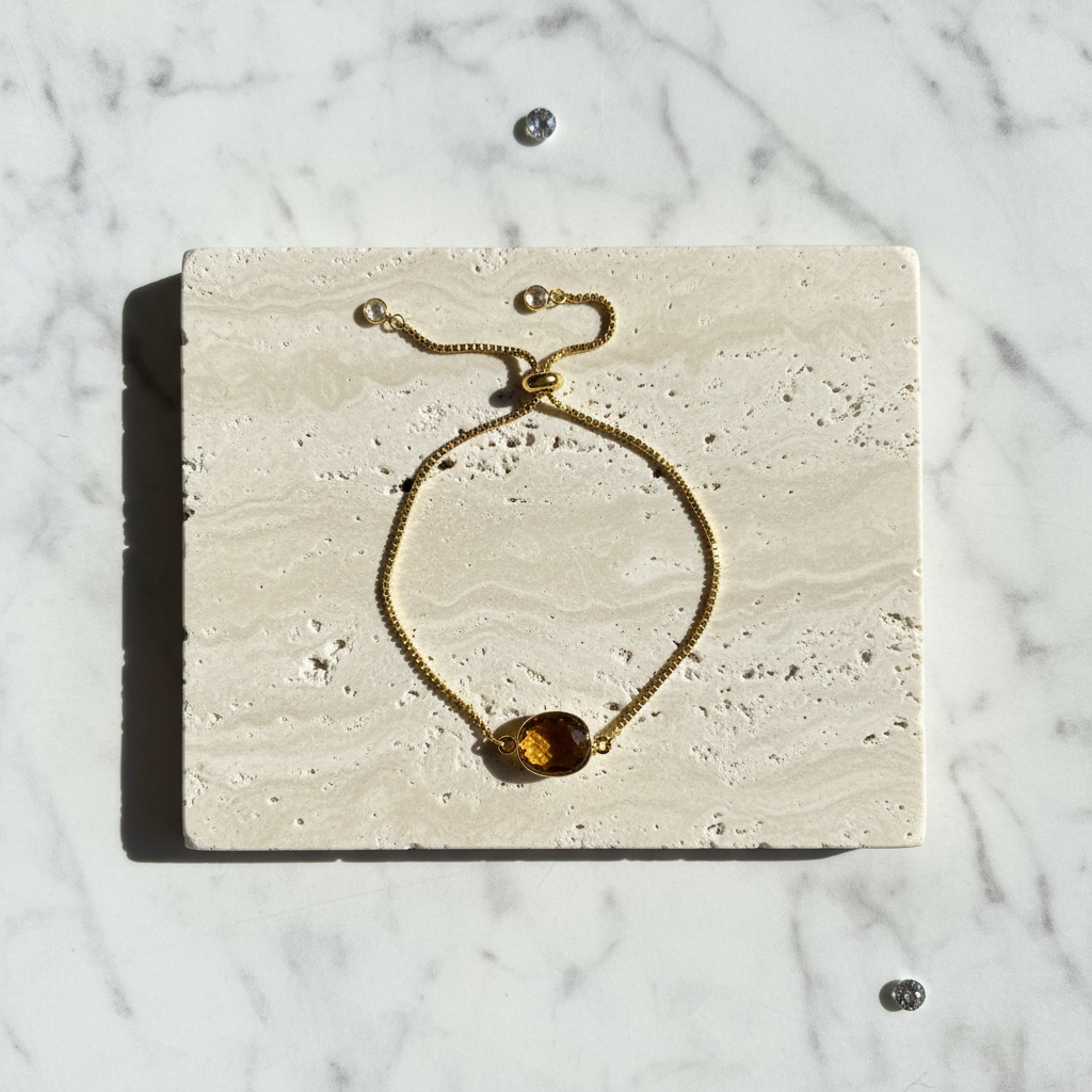 Citrine bezel bracelet in gold plate with a faceted honey citrine oval — November birthstone jewelry