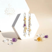 Earrings with gemstones on a light background