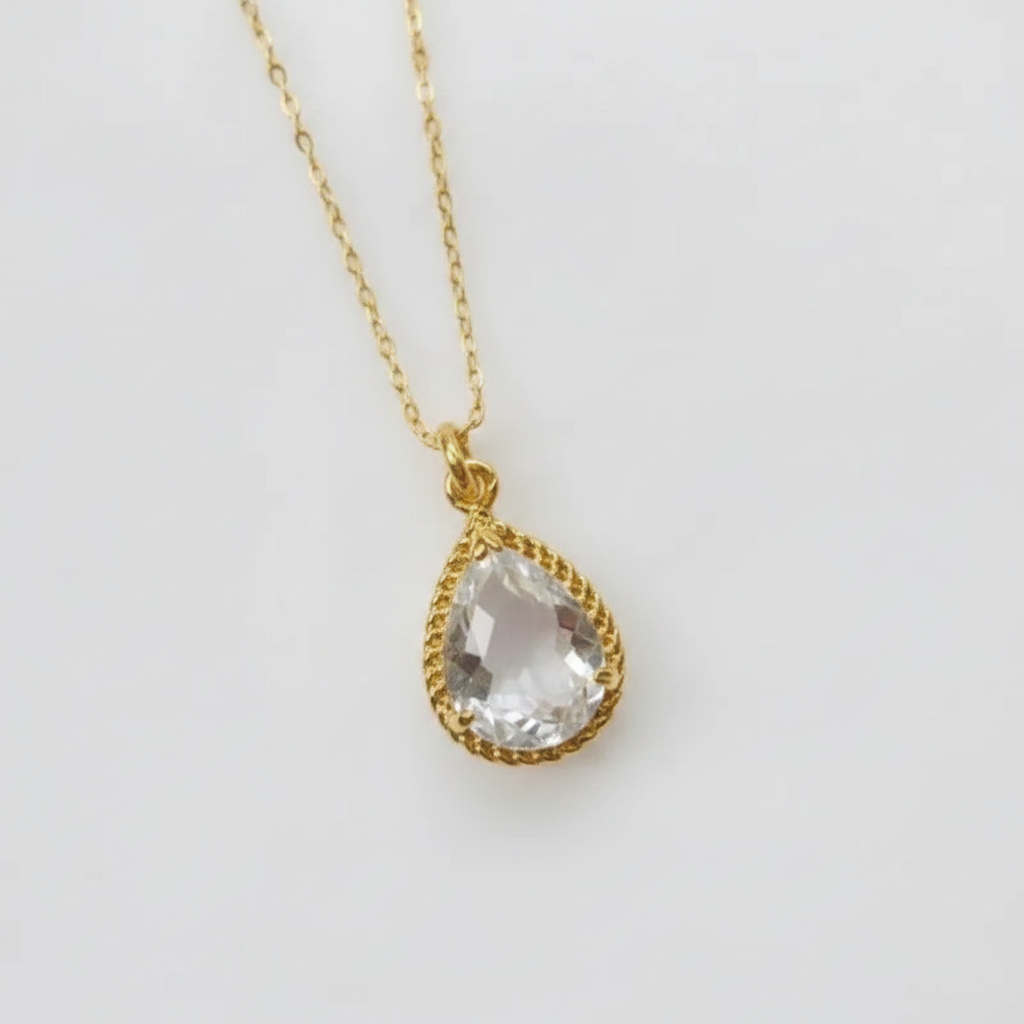 Clear exquisite teardrop pendant necklace in gold, April birthstone jewelry