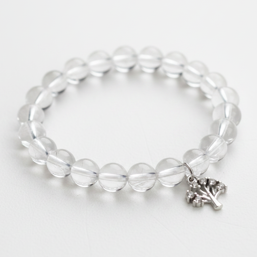 Clear quartz bracelet with a silver tree of life charm — add-on symbol charm for growth
