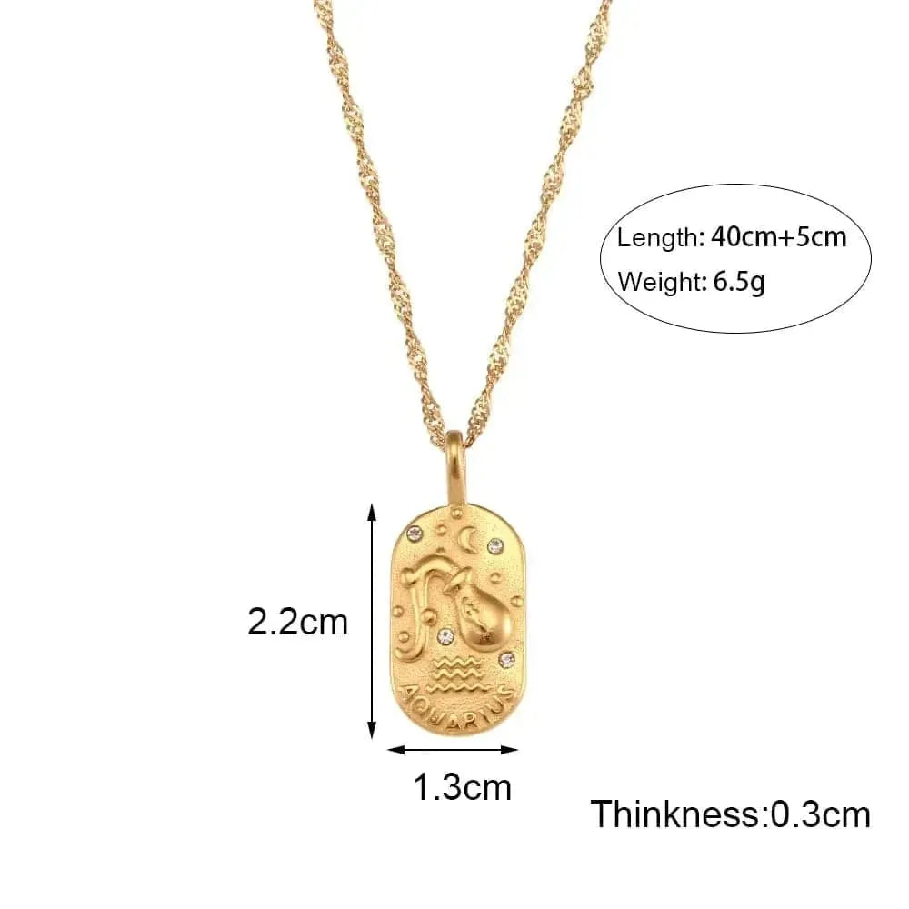 Gold necklace with pendant on a white background, showing measurements.