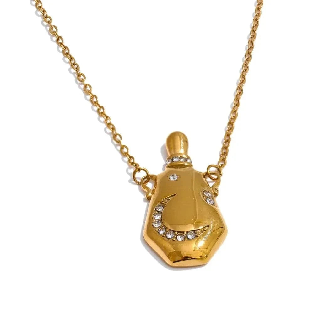 Gold necklace with a pendant shaped like a bottle on a white background