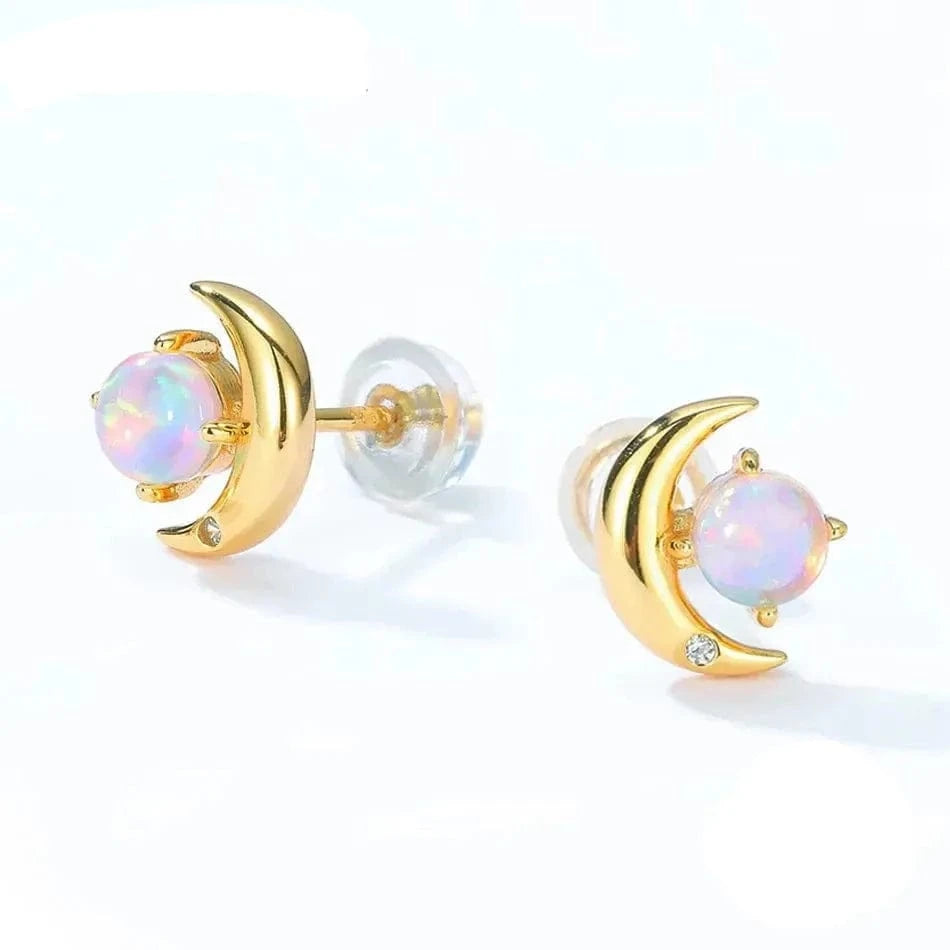 Gold moon-shaped earrings with opal stones on a white background
