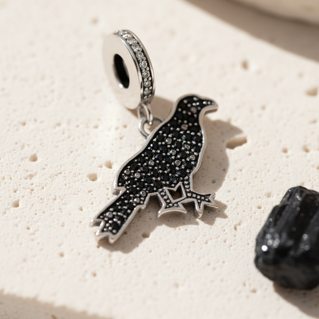Hallmarked 925 sterling silver crow and raven pendant, detail view